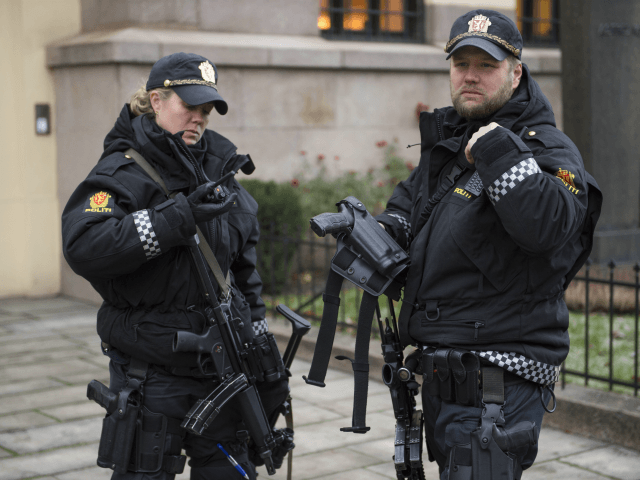 Armed police officers are seen outside the Nobel institute in Oslo on December 9, 2014. Du