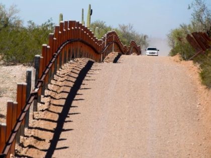Tucson Sector Border Patrol agents patrol outdated vehicle border barriers where large groups of Central American illegal aliens continue to cross the border. (File Photo: JIM WATSON/AFP/Getty Images)