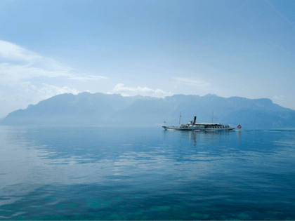 This photo taken on June 22, 2017 shows the paddle steamboat 'Vevey' sailing on Lake Geneva on June 22, 2017 off Saint Saphorin, western Switzerland. / AFP PHOTO / Fabrice COFFRINI (Photo credit should read FABRICE COFFRINI/AFP/Getty Images)