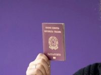 Dimitri Scarlato, an Italian composer and conductor lecturing at the Royal College of Music in London poses with his Italian passport at his home, on January 14, 2018. On Brexit he says: 'Brexit changed my perception of living in this country. The only positive outcome of Brexit -- I really …