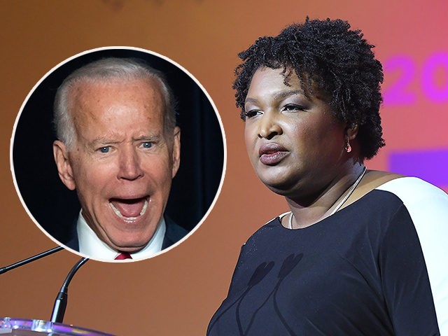 (INSET: Joe Biden) NEW ORLEANS, LA - JULY 07: Stacey Abrams speaks onstage during the 2018 Essence Festival presented by Coca-Cola at Ernest N. Morial Convention Center on July 7, 2018 in New Orleans, Louisiana. (Photo by Paras Griffin/Getty Images for Essence)