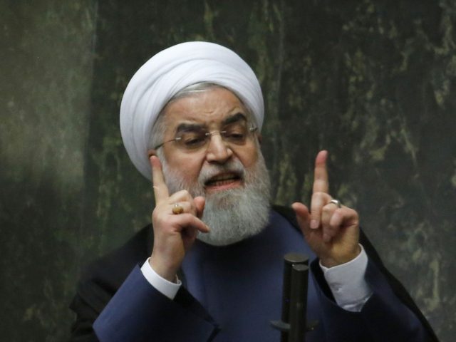 President Hassan Rouhani speaks at the Iranian Parliament in the capital Tehran, on August 28, 2018. - It was the first time Rouhani had been summoned by parliament in his five years in power, with MPs demanding answers on unemployment, rising prices and the collapsing value of the rial, which …