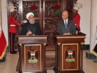Iranian President Hassan Rouhani (L) speaks during a joint press conference with his Iraqi counterpart Barham Saleh at the Presidential palace in Baghdad on March 11, 2019. - Iran's President arrived in Iraq for his first official visit, as Baghdad comes under pressure from Washington to limit political and trade …