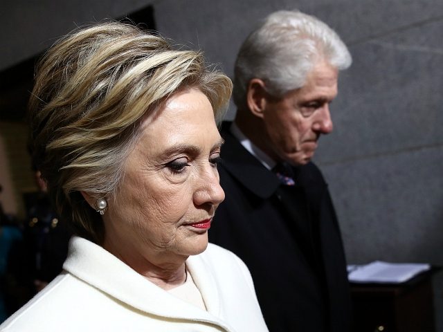 Former Democratic presidential nominee Hillary Clinton and former US President Bill Clinton arrive on the West Front of the US Capitol on January 20, 2017 in Washington, DC.Donald Trump took the first ceremonial steps before being sworn in as the 45th president of the United States Friday -- ushering in …