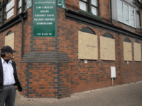 BIRMINGHAM, ENGLAND - MARCH 21: People view damage to Jam-E-Masjid Qiblah Hadhrat Sahib Gulhar Shareef mosque on Slade Road after a hammer attack last night braking it's windows last night, on March 21, 2019 in Birmingham, England. Anti-terror police have being called in to investigate the hammer attcaks on five …