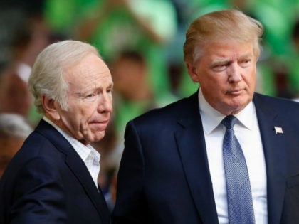Former Democratic vice presidential candidate, former Connecticut Sen. Joe Lieberman, an No Labels co-chairman, introduces Republican presidential candidate Donald Trump to speak at a No Labels Problem Solver convention, Monday, Oct. 12, 2015, in Manchester, N.H. (AP Photo/Jim Cole)