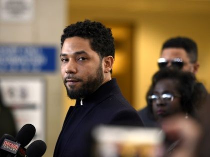 Actor Jussie Smollett talks to the media before leaving Cook County Court after his charge