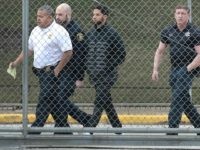 CHICAGO, ILLINOIS - FEBRUARY 21: Guards walk with Empire actor Jussie Smollett before he is released on bond from Cook County jail on February 21, 2019 in Chicago, Illinois. Smollett has been accused with arranging a homophobic, racist attack against himself in an attempt to raise his profile because he …