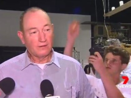 Kid smashes egg on New Zealand lawmaker - screenshot from 7 News Sydney clip.