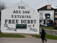 Londonderry, Northern Ireland LONDONDERRY, NORTHERN IRELAND - MARCH 14: Fresh graffiti reading 'No Justice, No Peace' is seen on Free Derry Corner in reaction to today's Bloody Sunday prosecution announcement on March 14, 2019 in Londonderry, Northern Ireland. Today, the Public Prosecution Service announced that one out of the seventeen soldiers accused of …