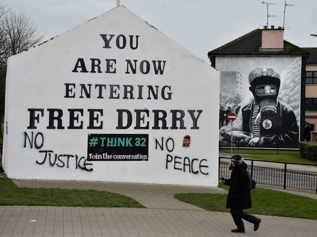 LONDONDERRY, NORTHERN IRELAND - MARCH 14: Fresh graffiti reading 'No Justice, No Peace' is seen on Free Derry Corner in reaction to today's Bloody Sunday prosecution announcement on March 14, 2019 in Londonderry, Northern Ireland. Today, the Public Prosecution Service announced that one out of the seventeen soldiers accused of …