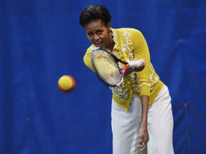 Michele Obama playing tennis