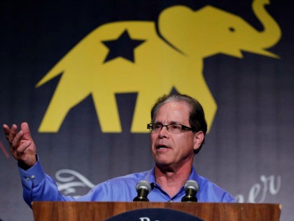 Republican U.S. Senate candidate Mike Braun speaks at the Indiana Republican Party Fall Dinner in Indianapolis, Friday, Oct. 12, 2018. (AP Photo/Michael Conroy)