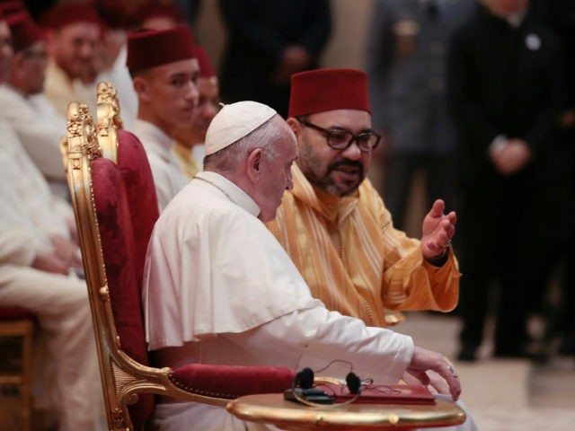Pope Francis sits by King Mohamed VI, at the Mohammed VI Institute, a school of learning f