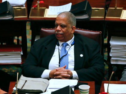 Sen. Leroy Comrie, D-Queens, works in the Senate Chamber at the Capitol on Thursday, March