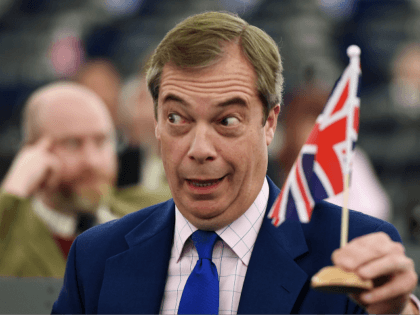 Former UK Independence Party (UKIP) leader, Brexit campaigner and member of the European Parliament Nigel Farage holds a little Union flag as he attends a debate on the preparation of the upcoming European Council meeting of March 21 and 22 and UKs withdrawal from the EU during a plenary session …