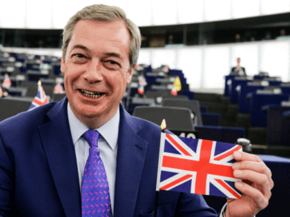 Member of the European Parliament and former leader of the anti-EU UK Independence Party (UKIP) Nigel Farage shows a Union Jack flag at the European Parliament in Strasbourg, eastern France, on April 5, 2017. The European Parliament will on April 5 lay down its 'red lines' for negotiations over a …