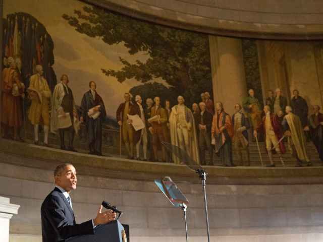 Obama in front of founding fathers