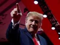 President Donald Trump points to the cheering audience as he arrives to speak at Conservative Political Action Conference, CPAC 2019, in Oxon Hill, Md., Saturday, March 2, 2019.