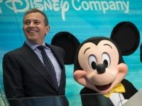 NEW YORK, NY - NOVEMBER 27: (L to R) Chief executive officer and chairman of The Walt Disney Company Bob Iger and Mickey Mouse look on before ringing the opening bell at the New York Stock Exchange (NYSE), November 27, 2017 in New York City. Disney is marking the company's …