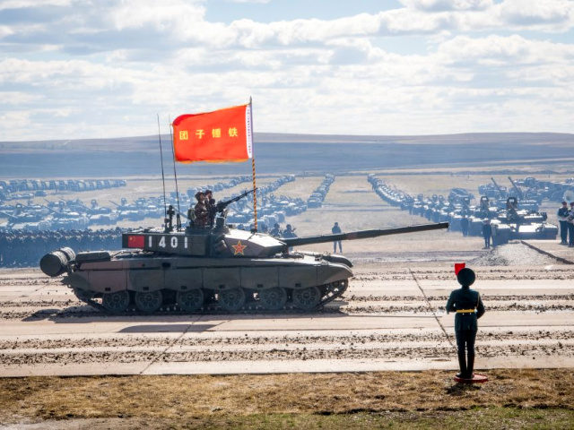 Russian, Chinese and Mongolian troops and military equipment parade at the end of the day
