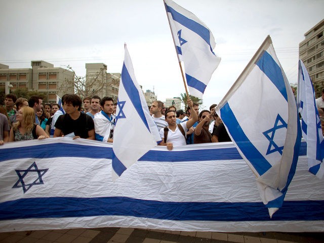 Israeli right-wing activists demonstrate against a 'Nakba Day' ceremony held by Palestinian and Left-wing Israeli students at Tel Aviv University on May 14, 2012 in Tel Aviv, Israel.