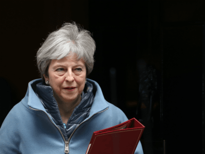 Britain's Prime Minister Theresa May leaves 10 Downing Street in London on March 25, 2019. - British Prime Minister Theresa May chaired a meeting of her cabinet amid reports of an attempted coup by colleagues over her handling of Brexit. (Photo by Isabel Infantes / AFP) (Photo credit should read …