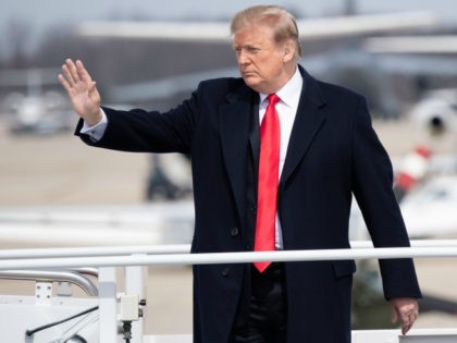 US President Donald Trump boards Air Force One prior to departure from Joint Base Andrews in Maryland, March 20, 2019. - Trump is travelling to Ohio to tour the Lima Army Tank Plant and for a fundraiser in Canton. (Photo by SAUL LOEB / AFP) (Photo credit should read SAUL …