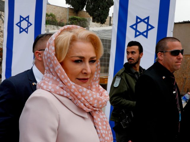 Romanian Prime Minister Viorica Dancila (L) visits the Western Wall, Judaism's holiest worship site, in the old city of Jerusalem on April 26, 2018. (Photo by GALI TIBBON / AFP) (Photo credit should read GALI TIBBON/AFP/Getty Images)