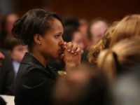 MILWAUKEE - FEBRUARY 16: Actress Kerry Washington listens as Democratic presidential candidate Sen. Barack Obama (D-IL) speaks to members of the Democratic Party of Wisconsin at their Founders Day Dinner at the Midwest Express Center February 16, 2008 in Milwaukee, Wisconsin. Presidential candidate Senator Hillary Clinton (D-NY) also addressed the …
