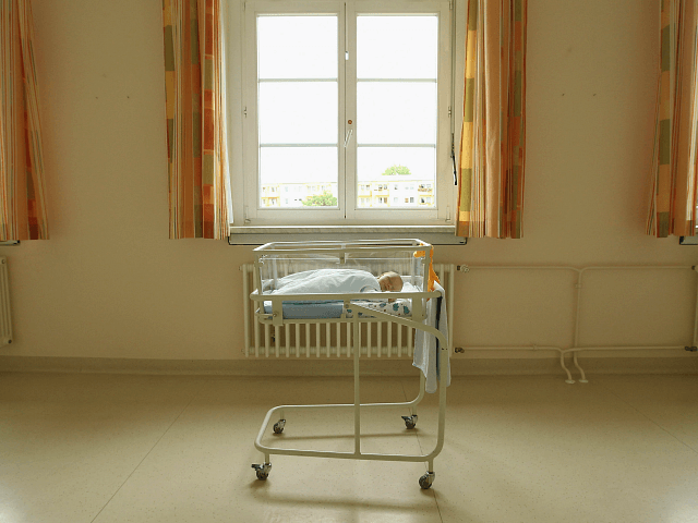 UNDISCLOSED, GERMANY - AUGUST 12: A 4-day-old newborn baby, who has been placed under a wi