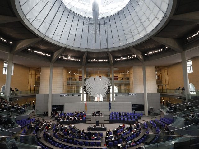 BERLIN, GERMANY - FEBRUARY 20: Members of the Parliament seat in the the plenary hall as F