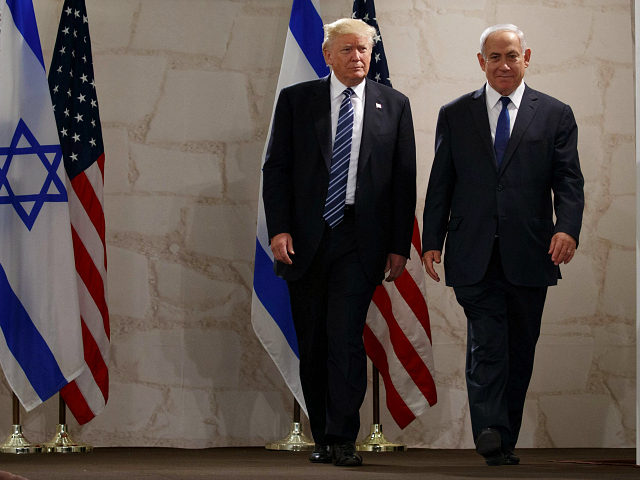 Israeli Prime Minister Benjamin Netanyahu and President Donald Trump arrive for a speech a