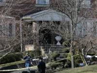 Police work near the scene where an alleged leader of the Gambino crime family was shot and killed in the Staten Island borough of New York, Thursday, March 14, 2019. Francesco "Franky Boy" Cali, 53, was found with multiple gunshot wounds to his body at his home Wednesday night. (AP …