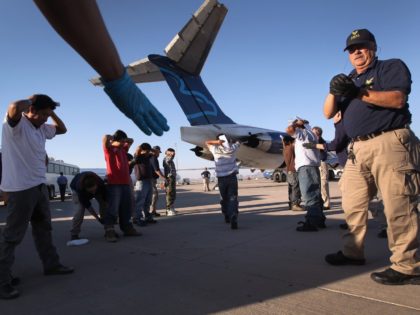 MESA, AZ - JUNE 24: Undocumented Guatemalan immigrants are body searched before boarding a deportation flight to Guatemala City, Guatemala at Phoenix-Mesa Gateway Airport on June 24, 2011 in Mesa, Arizona. The U.S. Immigration and Customs Enforcement agency, ICE, repatriates thousands of undocumented Guatemalans monthly, many of whom are caught …