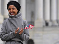 WASHINGTON, DC - MARCH 08: Rep. Ilhan Omar (D-MN) rallies with fellow Democrats before voting on H.R. 1, or the People Act, on the East Steps of the U.S. Capitol March 08, 2019 in Washington, DC. With almost zero chance of passing the Senate, H.R. 1 is a package of …