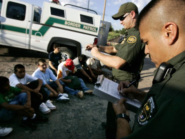 NOGALES, AZ - AUGUST 30: U.S. Border Patrol agents, David Macias (R) and Kurt Dannawitz, p