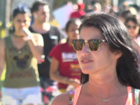 MIAMI BEACH, Fla. –– A party on South Beach last week turned into a massive brawl, with a young woman repeatedly getting kicked by a large group of rowdy spring breakers as teens yelled and filmed the scuffle with their phones.