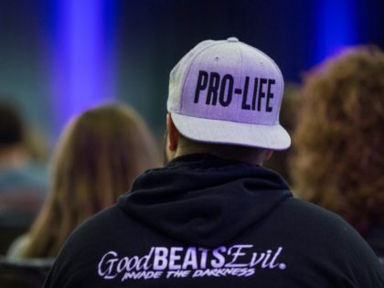 WASHINGTON, DC - JANUARY 17: A pro-life supporter wears a hat at a youth rally during the 2019 March for Life Conference and Expo on January 17, 2019 in Washington, DC. (Photo by Zach Gibson/Getty Images)