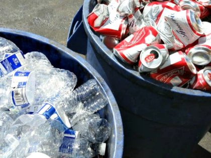 In this July 5, 2016, file photo, cans and plastic bottles brought in for recycling are se