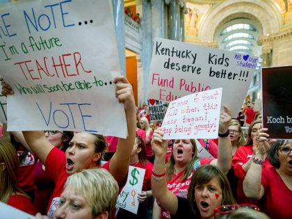 FILE - In this April 13, 2018, file photo, teachers from across Kentucky gather inside the