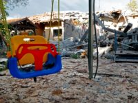 A general view shows a damaged house after it was hit by a rocket in the village of Mishmeret, north of Tel Aviv on March 25, 2019. - A rocket hit a house in a community north of Tel Aviv and caused it to catch fire on Monday, wounding five …