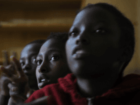 Pupils at the Kambui School for the Deaf, just outside Nairobi, take part in 'Read-Aloud' day activities, on January 31, 2013, in Kiambu. The 'Read-Aloud' day is celebrated worldwide to show that the right to read and write is an entitlement to all. More than 300 schools, human rights clubs …