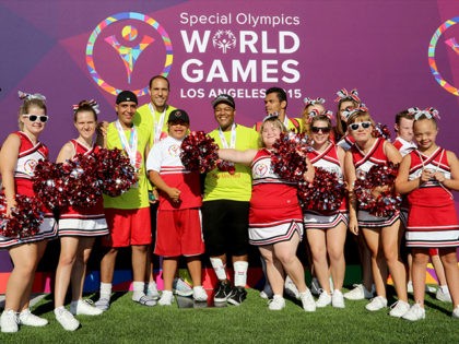 LOS ANGELES, CA - JULY 28: Starkey Hearing Foundation Ambassador Kyle Massey (C) and team Respect participate in The Special Olympics Unified Sports Experience Football Game at UCLA on July 28, 2015 in Los Angeles, California. (Photo by Rachel Murray/Getty Images for Starkey Hearing Foundation)