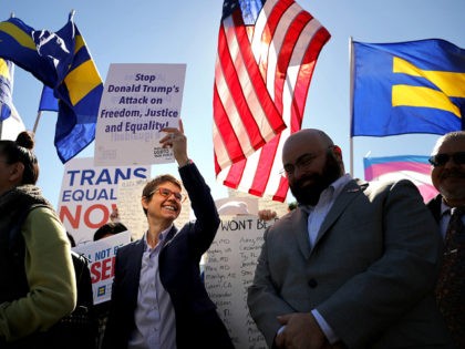 WASHINGTON, DC - OCTOBER 22: L.G.B.T. activists from the National Center for Transgender Equality, partner organizations and their supporters hold a 'We Will Not Be Erased' rally in front of the White House October 22, 2018 in Washington, DC. Members of the L.G.B.T. community and their supporters across the country …