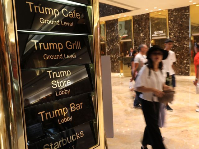 People walk through Trump Tower on Fifth Avenue in Manhattan on August 24, 2018 in New Yor