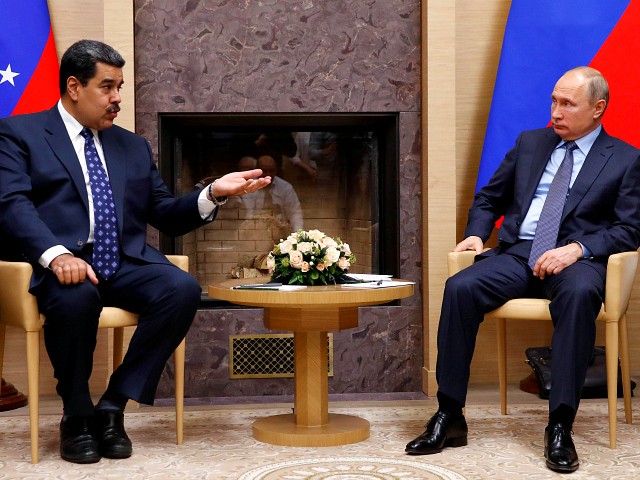Russian President Vladimir Putin (R) meets with his Venezuelan counterpart Nicolas Maduro at the Novo-Ogaryovo state residence outside Moscow on December 5, 2018. (Photo by MAXIM SHEMETOV / POOL / AFP) (Photo credit should read MAXIM SHEMETOV/AFP/Getty Images)