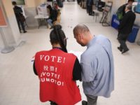 Voters begin casting their ballots at City Hall in San Francisco, California on November 6, 2018. - Americans started voting Tuesday in critical midterm elections that mark the first major voter test of Donald Trump's controversial presidency, with control of Congress at stake. About three quarters of the 50 states …