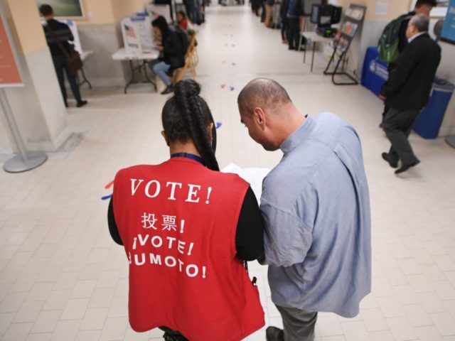 Voters begin casting their ballots at City Hall in San Francisco, California on November 6