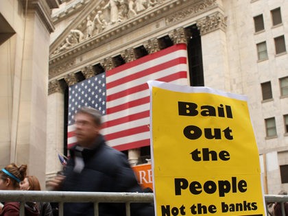 NEW YORK - OCTOBER 24: Protesters gather outside of the New York Stock Exchange October 24, 2008 in New York City. The demonstrators were frustrated with the goverment bailout package and voiced concerns about poor and working class Americans. It was another tumultuous week on Wall St. with the Dow …